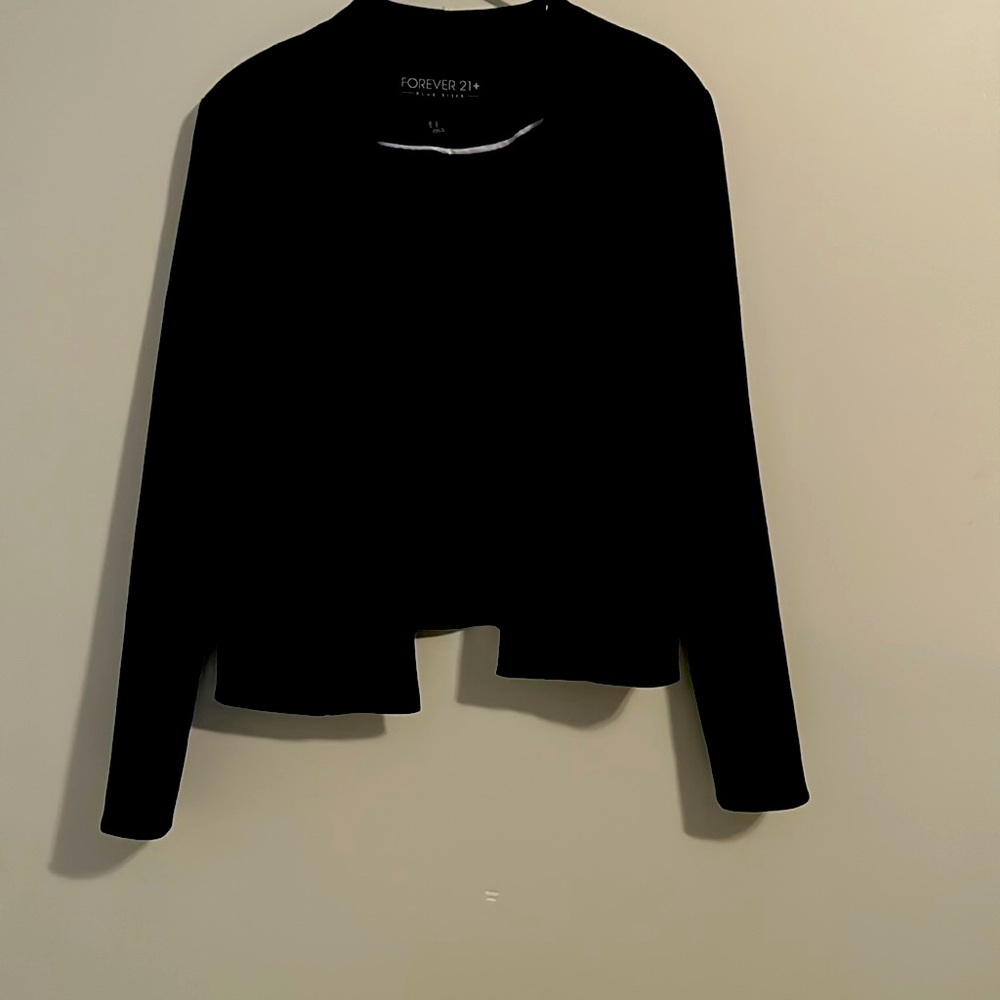 Black blazer is looking for a home! Size 0x never worn.